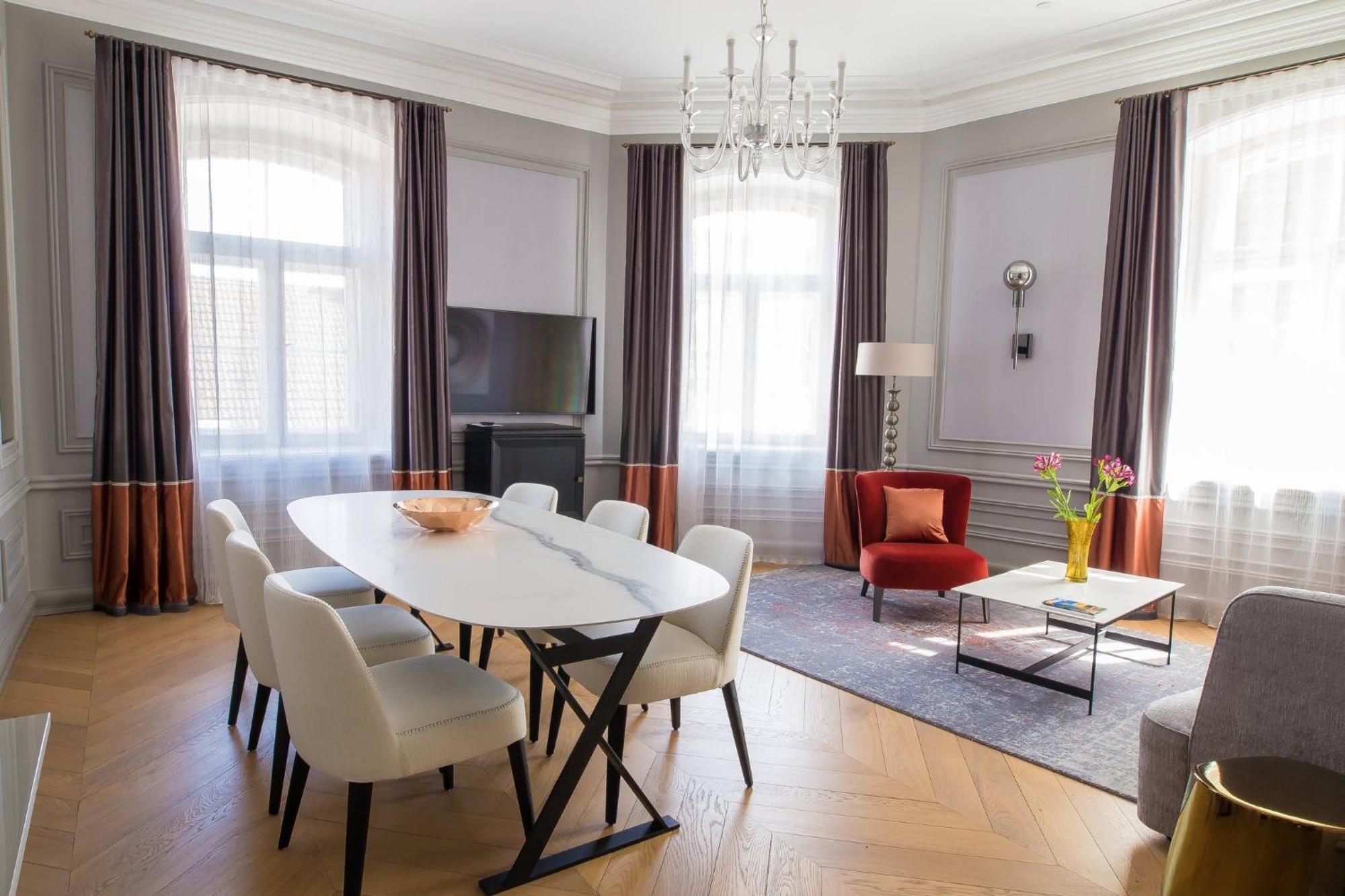 Hotel Telegraaf, Autograph Collection Ταλίν Εξωτερικό φωτογραφία A living room in a serviced apartment in Berlin, Germany